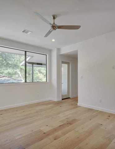 room with hardwood floor Peoples Signature Flooring Austin Texas