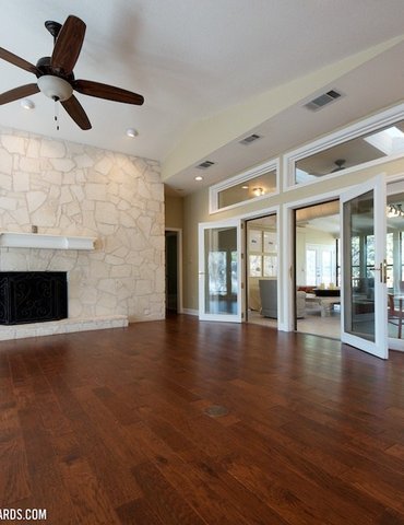 living room with hardwood floor Peoples Signature Flooring Austin Texas