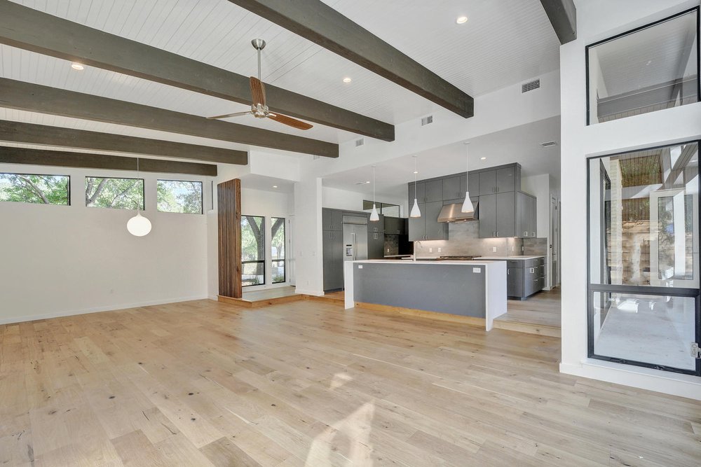 living room/kitchen with hardwood floor Peoples Signature Flooring Austin Texas, 7.5 Inch Wide Wirebrush European White Oak Natural