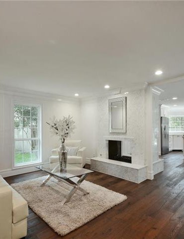 living room/dining room with hardwood floor Peoples Signature Flooring Austin Texas