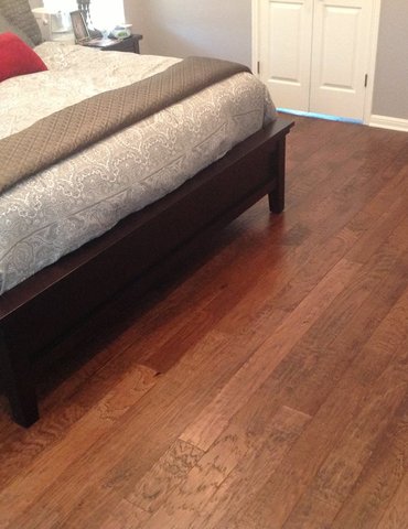 bedroom with hardwood floor Peoples Signature Flooring Austin Texas