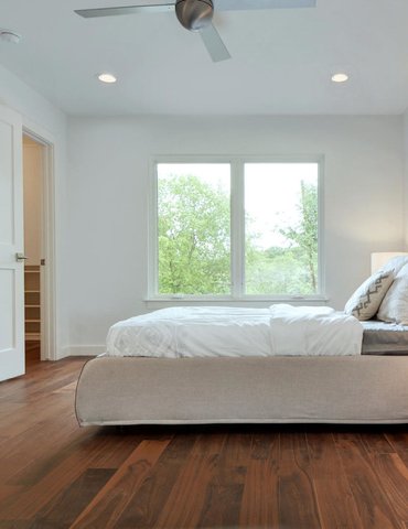 bedroom with hardwood floor Peoples Signature Flooring Austin Texas, Walnut Natural 5 Inch