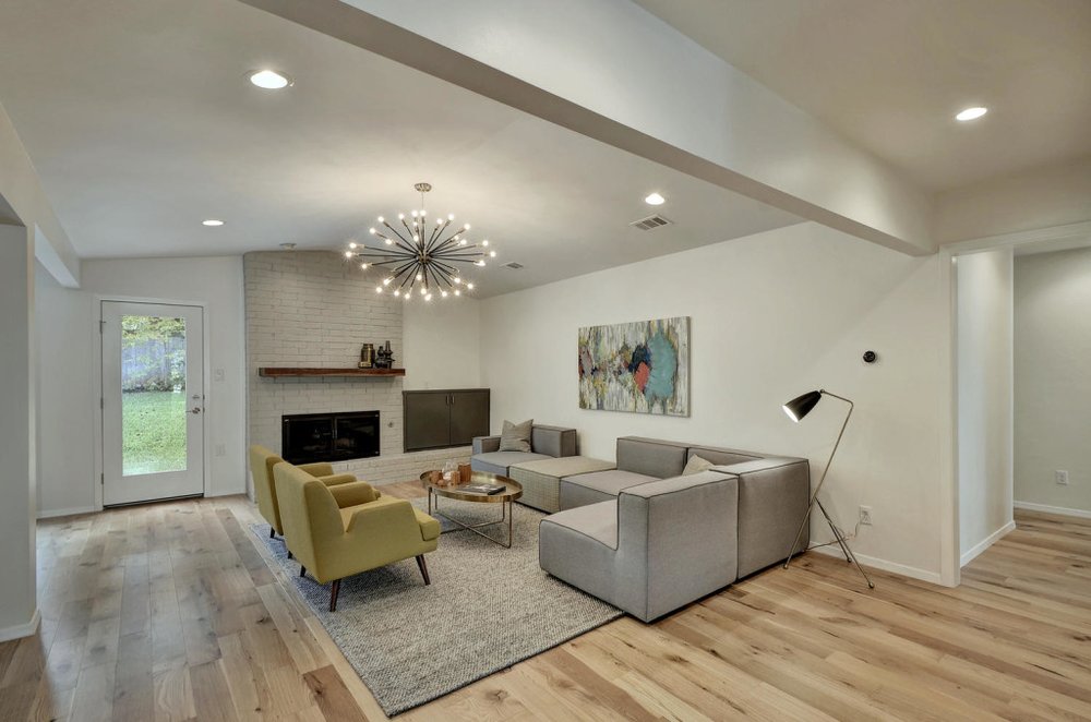 living room with hardwood floor Peoples Signature Flooring Austin Texas