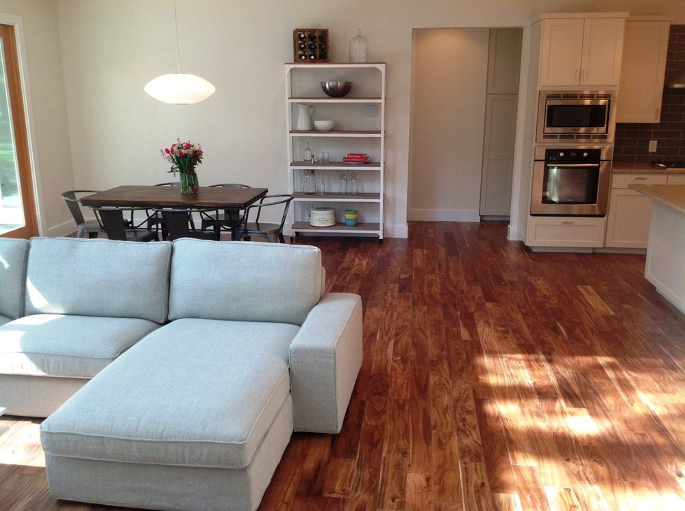 living room with hardwood floor Peoples Signature Flooring Austin Texas