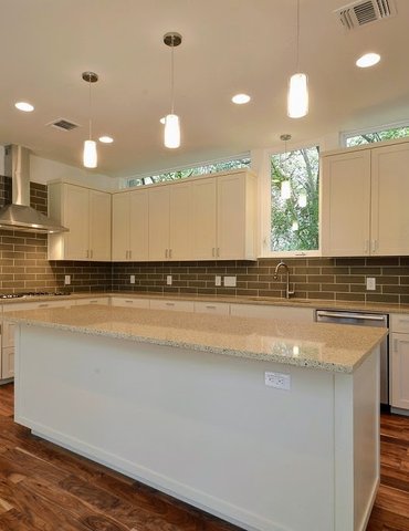 kitchen with hardwood floor Peoples Signature Flooring Austin Texas, Acacia Natural 5 Inch (Hand Sculpted)