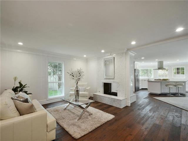 living room/dining room with hardwood floor Peoples Signature Flooring Austin Texas